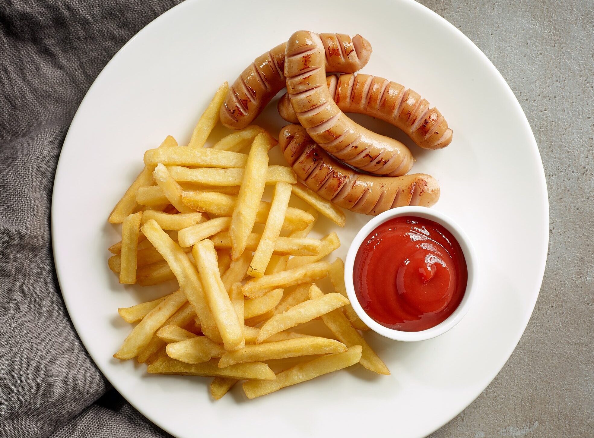 fried potatoes and sausages