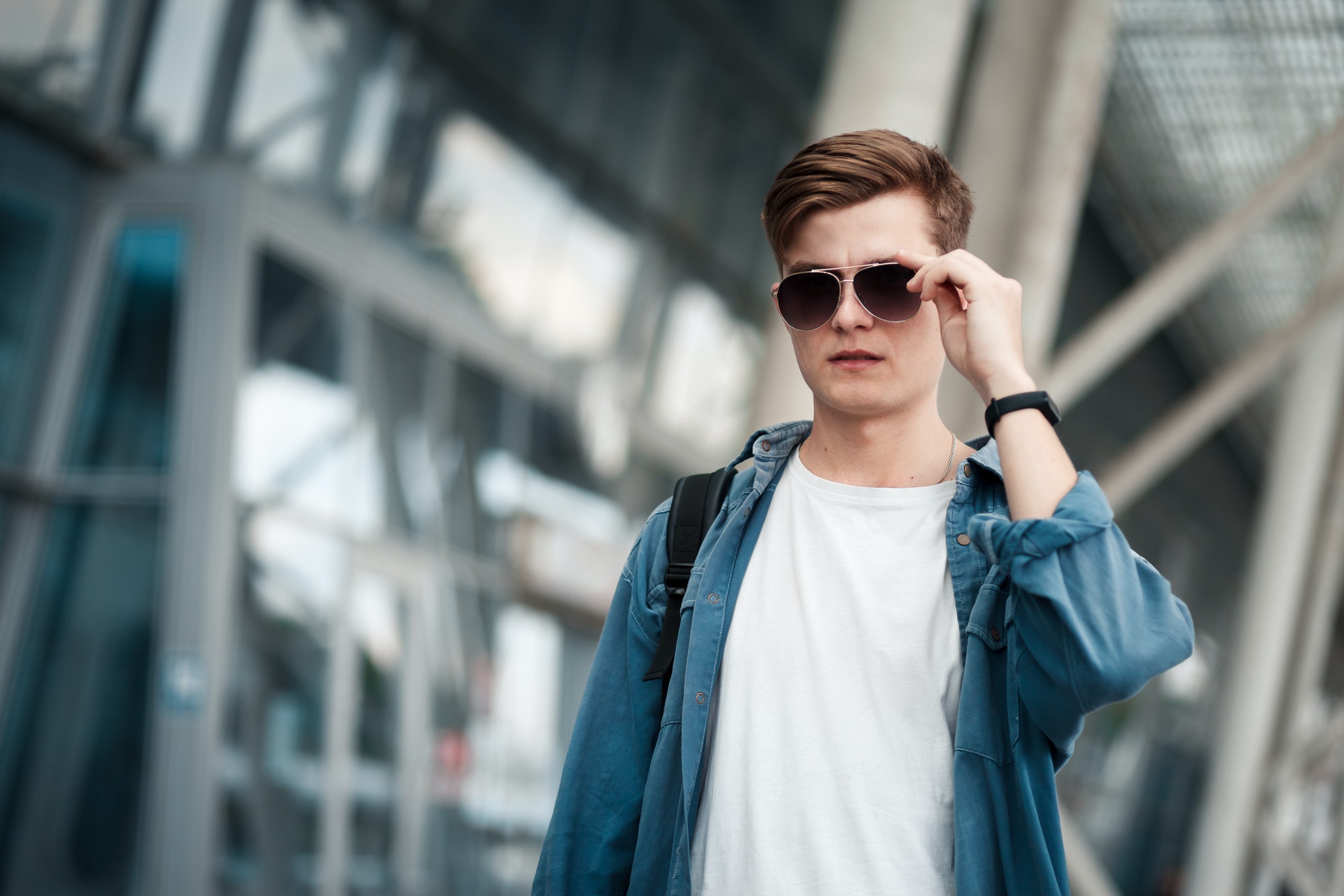 Portrait of a young handsome boy in sunglasses